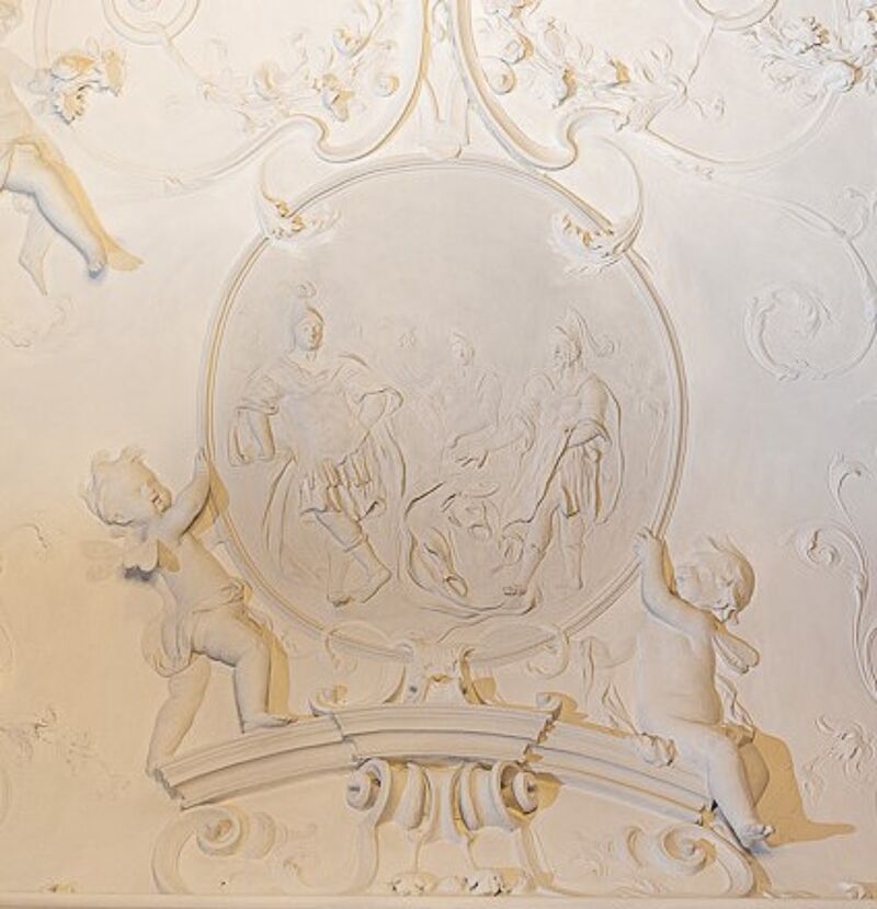 © Residenz zu Salzburg, Prunkräume, Foto: Stürzenbaum Stuckmedaillon - Der Weise Kalanos gibt Alexander ein Gleichnis der klugen Herrschaft